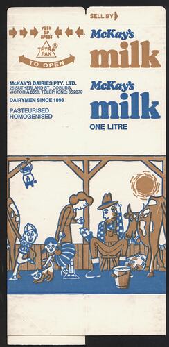 Flat-packed milk carton with cartoon illustrations.