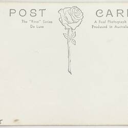 White back of a 'Rose Series' postcard. Rose logo printed in grey.