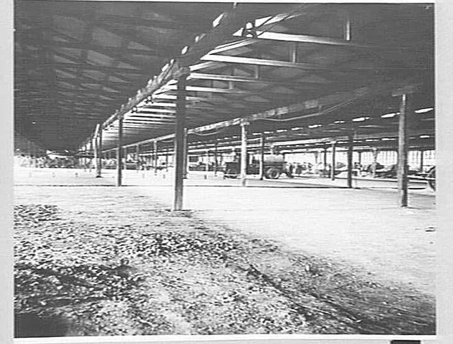SURFACING FLOOR WITH `COLAS' IN STORAGE SHEDS ON BALLARAT ROAD: MAY 1940