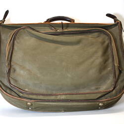 Back of khaki canvas valise (bag).