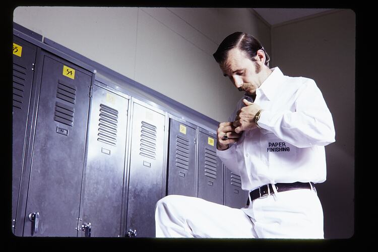 Kodak Australasia Pty Ltd, Man Buttoning Shirt, Coburg, circa 1980s