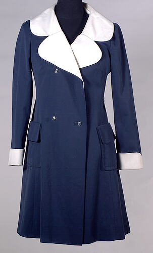 Navy mini coat dress, cream collar and cuff.
