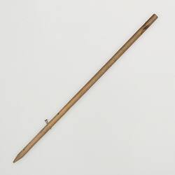 Wooden skewer. Part of game.