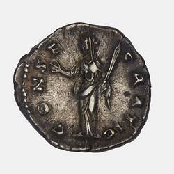 Round silver coin. Figure standing facing left, her right hand raised, with her left she holds a short torch. Text around.