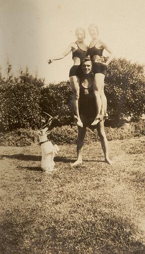 Digital Photograph - Twin Girls Balancing on Man's Hands, St Kilda, 1930-1935