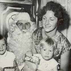 Digital Photograph - Woman with Two Girls Sitting on Santa Claus Knee, Melbourne, 1961