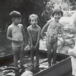 Digital Photograph - One Boy & Two Girls in Canvas Wading Pool, Backyard, Kew, 1954