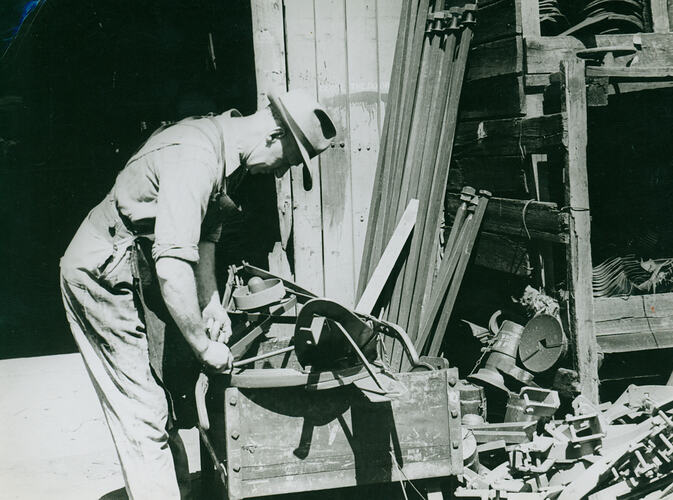 Photograph - Daniel Harvey Ltd., Workman Assembling Machinery, Circa 1950
