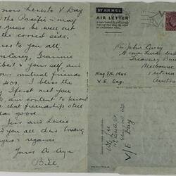 Hand-written letter with address and stamp.