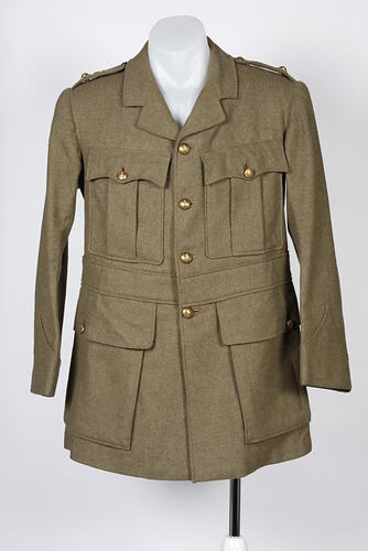 Khaki woollen tunic with four pockets. Jacket is part of an Australian Army Medical Corps, 1914-18 uniform.