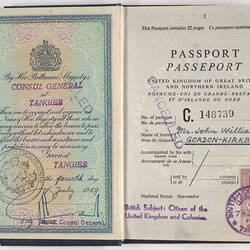 British Passport, open. Pages have printed text and are stamped.