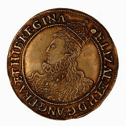 Coin, round, Crowned bust of the Queen, wearing a richly decorated dress and ruff, facing left; text around.