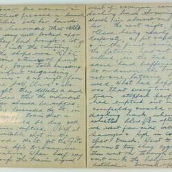 Open book, 2 cream pages with faint grid pattern. Cursive handwritten text in blue ink. Page 4 and 5.