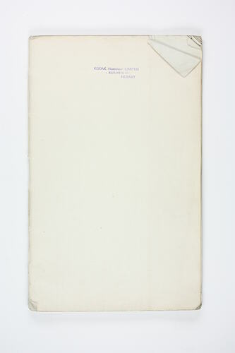 Paper book with stamped title.