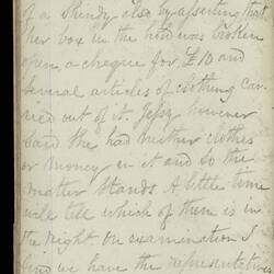 Open diary with handwritten text on discoloured worn page.