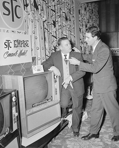 Standard Telephone & Cables Ltd, Two Men Standing with a Television, Melbourne, Victoria, 13 Jul 1959
