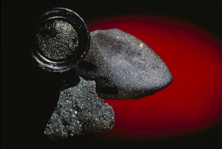 Meteorite and tektite specimens.