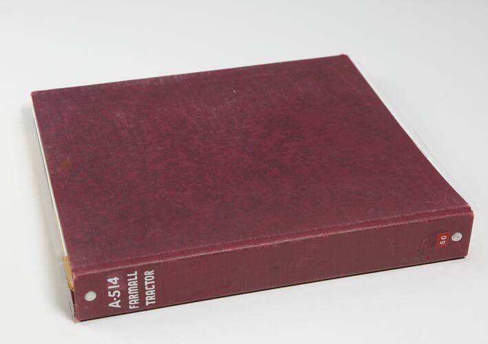 Photograph Album of harvesting equipment.