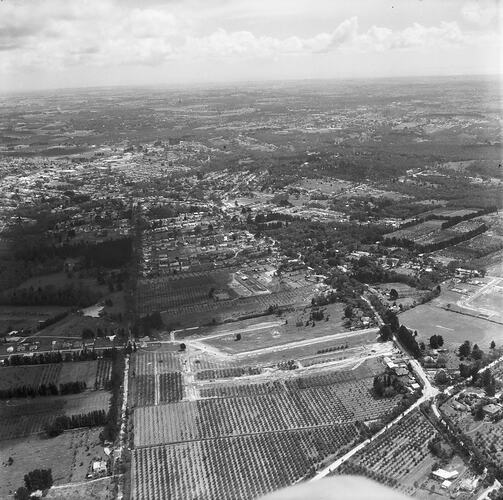 Monochrome aerial image of a suburb.