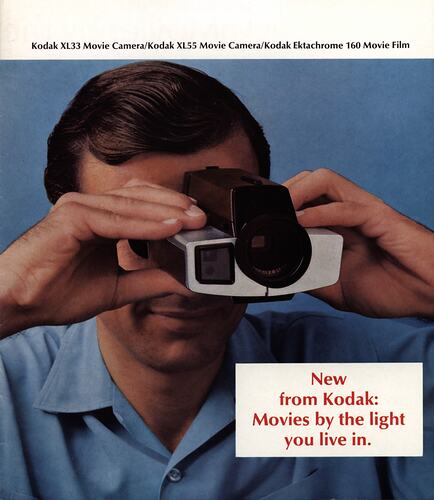 Brochure featuring photograph of man using a camera.