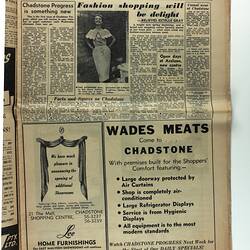 Inside page of newspaper with photo of woman and text