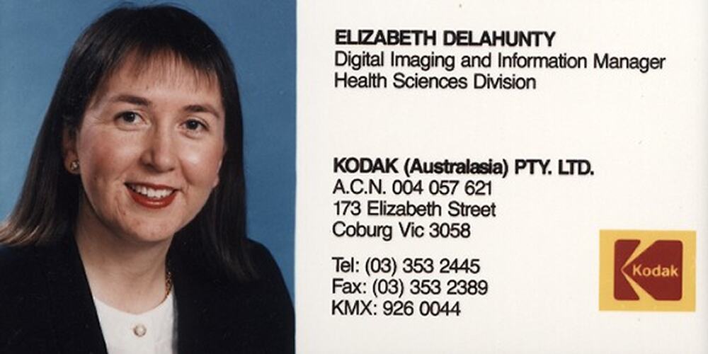 Printed business card with colour photograph of woman.