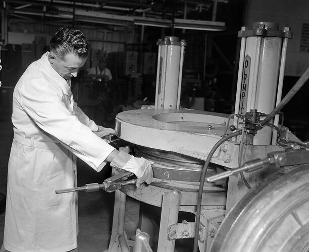 Beaurepaires, Workman Using Machinery, Flemington, Victoria, 04 Mar 1960