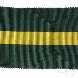 Ribbon with three stripes of green and yellow.