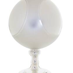 Mirrored glass globe on glass stand.