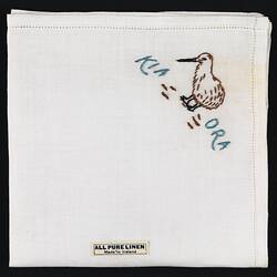 Folded handkerchief with embroidered kiwi bird.