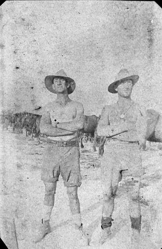 Two Bare Chested Soldiers