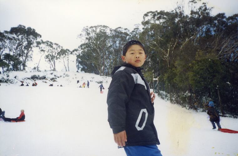 Lin Jong playing in the snow at Mt Baw Baw, Victoria, 1999