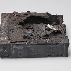 Fire afffected melted computer hard drive.