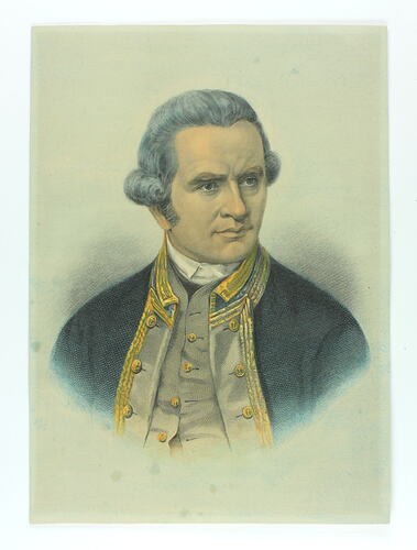 Man with grey moulded hair and blue jacket.