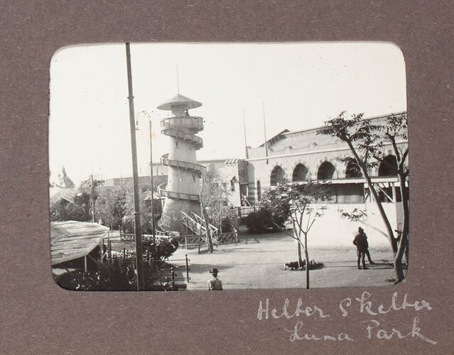 Tower wrapped with spiral structure in amusement park.