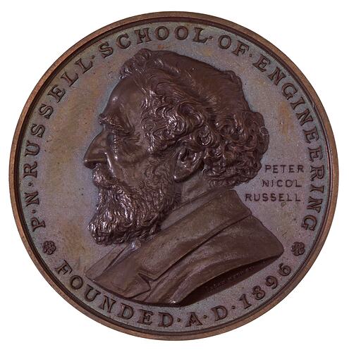 Round medal with bust of P.N. Russell facing left. Text around.