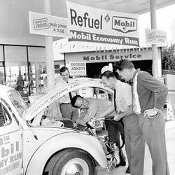 Negative - Refuelling a Volkswagen 'Beetle' Motor Car at a Service Station During the 'Mobil Econommy Run', 1962
