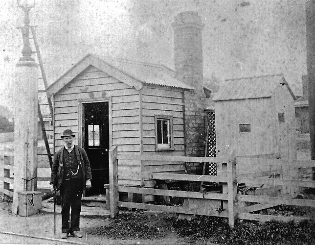 [Gatekeeper at Doveton St railway gates, Ballarat, circa 1900.]