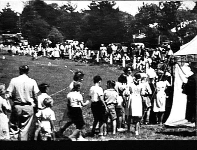 SUNSHINE HARVESTER WORKS PICNIC 1950: HELD AT FRANKSTON PARK: CHILDREN FORMED A CONSTANT QUEUE AT THEIR REFESHMENT MARQUEE AND WERE WELL REWARDED FOR THEIR PATIENCE: `SUNSHINE REVIEW': APRIL 1950