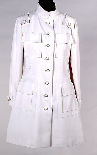 White coat on mannequin with stand-up collar.