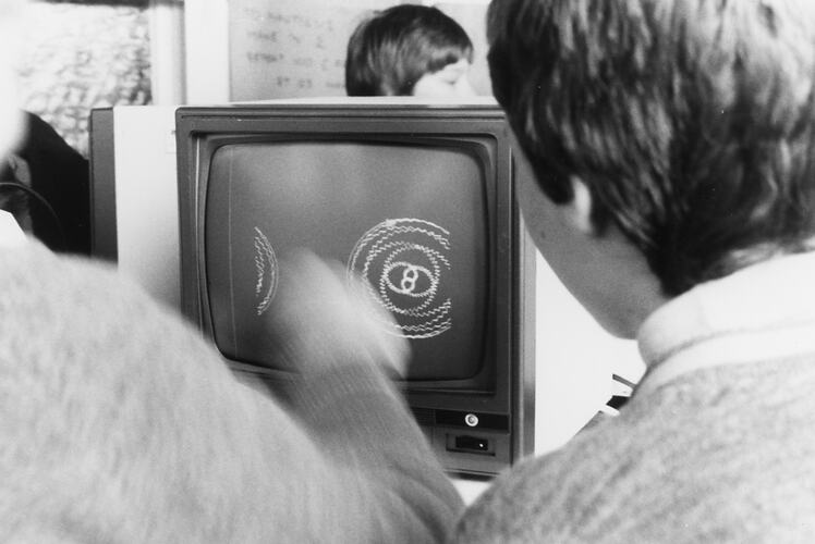Young person working on a computer.