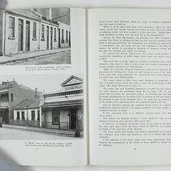 Open booklet with white pages and black printing. Houses on left page.