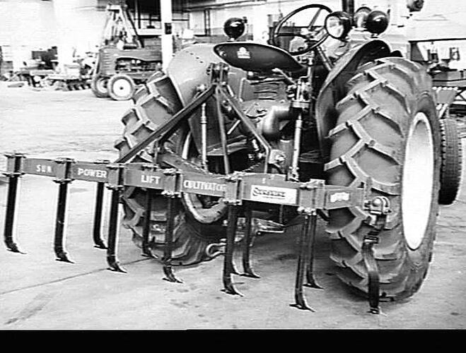 744 D TRACTOR W/- CONVERTED `SUNPOWERLIFT' 3 POINT RIGID TINE CULTIVATOR ATTACHED: JAN 1954