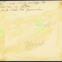 Discoloured back of photograph with handwriting.