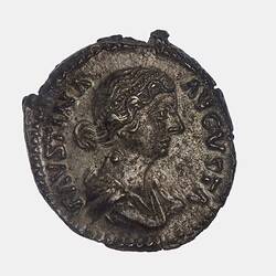 Roughly round coin. Draped bust of female facing right. Text around.