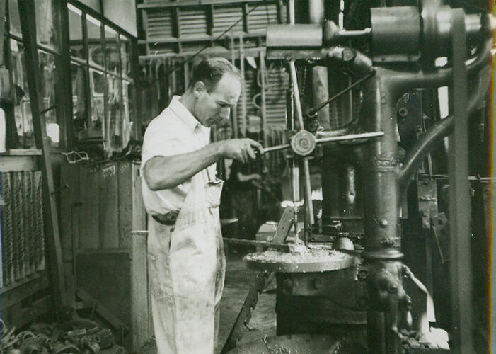 Photograph - Workman in engineering workshop