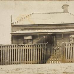 Digital Photograph - Girl in Pinafore Standing Outside Weatherboard House, Sandringham, 1912
