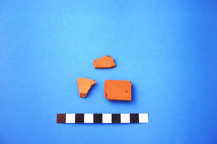 Three unglazed terracotta fragments.