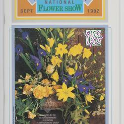 Programme cover with yellow and blue flowers. Blue, yellow, orange, green printed heading, text and borders above.