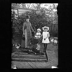Glass Negative - Kate Beckett & Family in Backyard, Charlton, Victoria, 1891